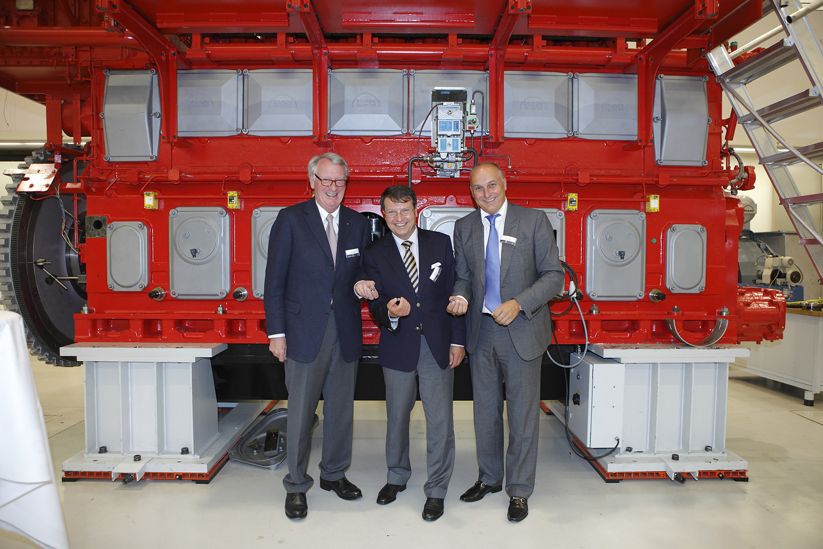 Herbert Scheel, Ernst Holme, Ulrich Humbaur bei MAN Diesel & Turbo im Jahr 2011, Foto: IHK