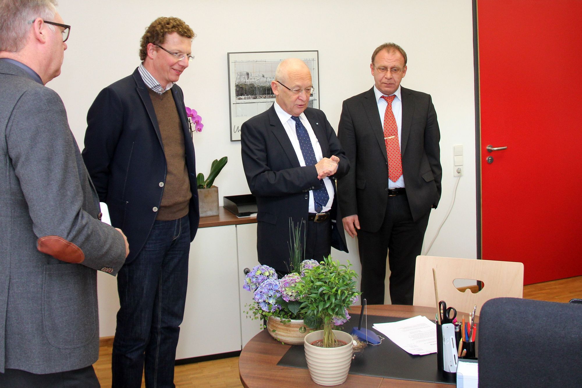 Robert Langer, Thomas Schuhmaier, Dr. Ivo Holzinger und Michael Foit. Foto: Stadt Memmingen