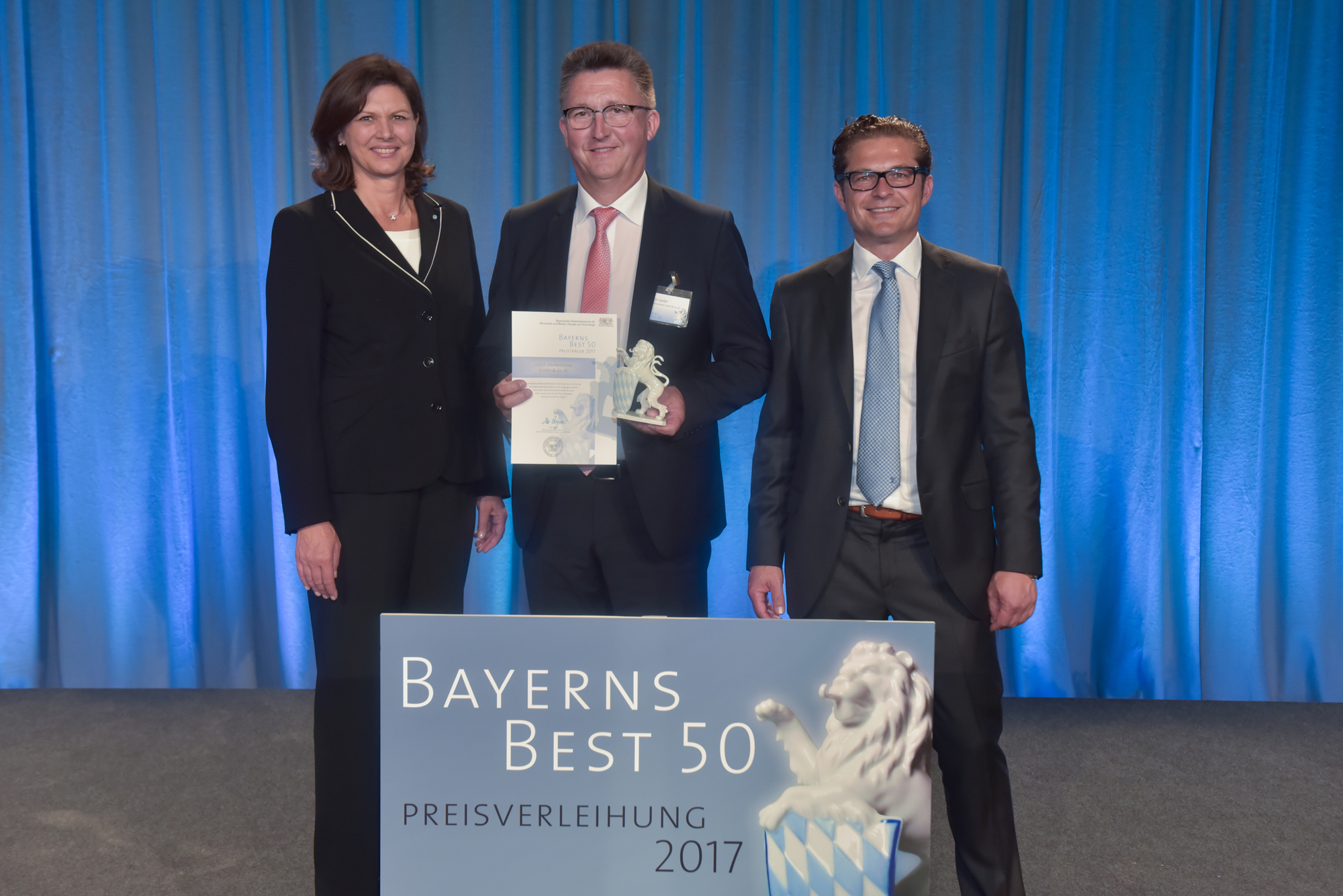 Ministerin Ilse Aigner, GEDA-Geschäftsführer Johann Sailer und Juror Tilmann Orth. Foto: StMWi/Siegbert Heuser