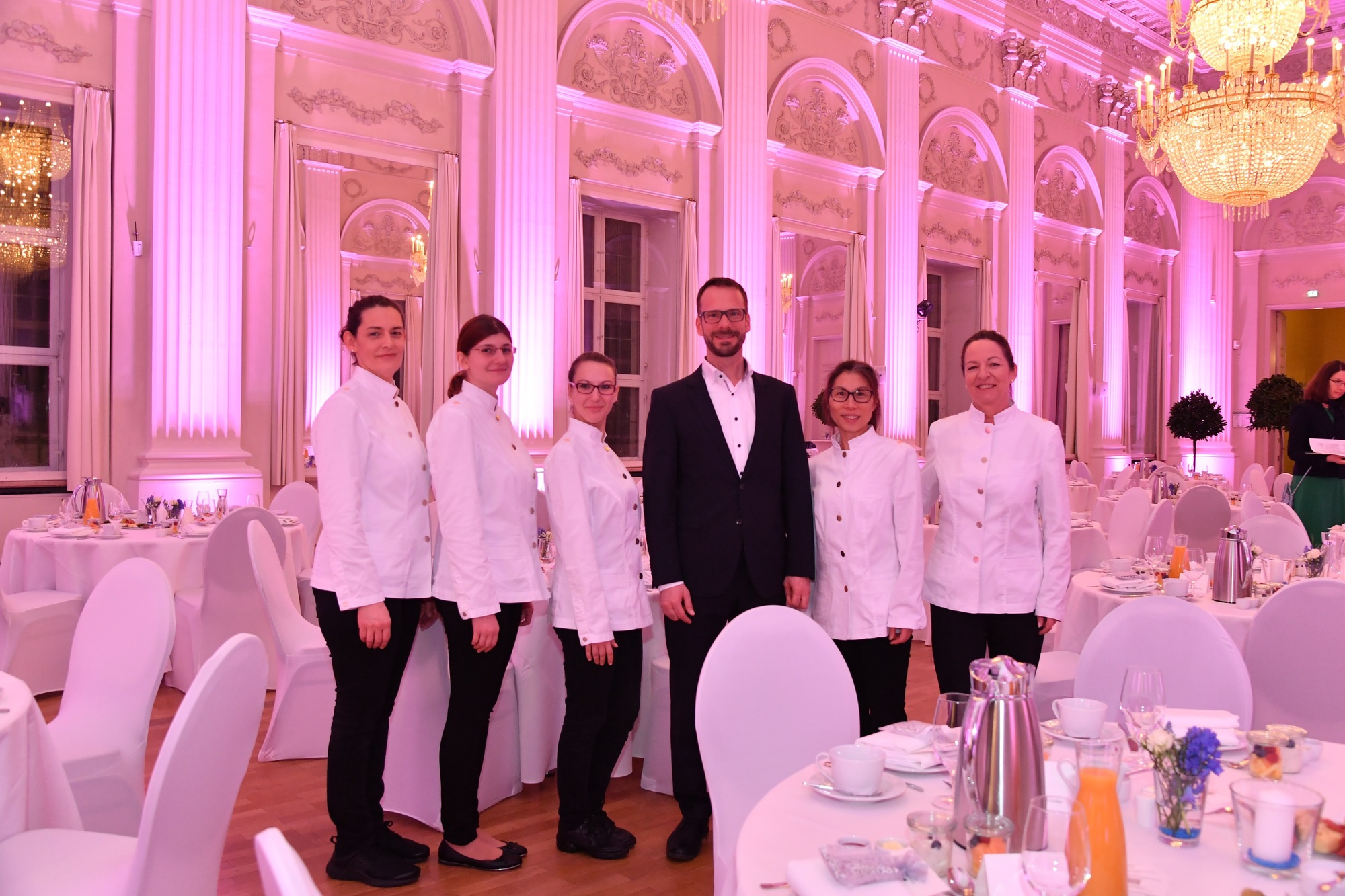 Florian Egger mit seinem Team in der Münchner Residenz. Foto: Bayerische Staatskanzlei