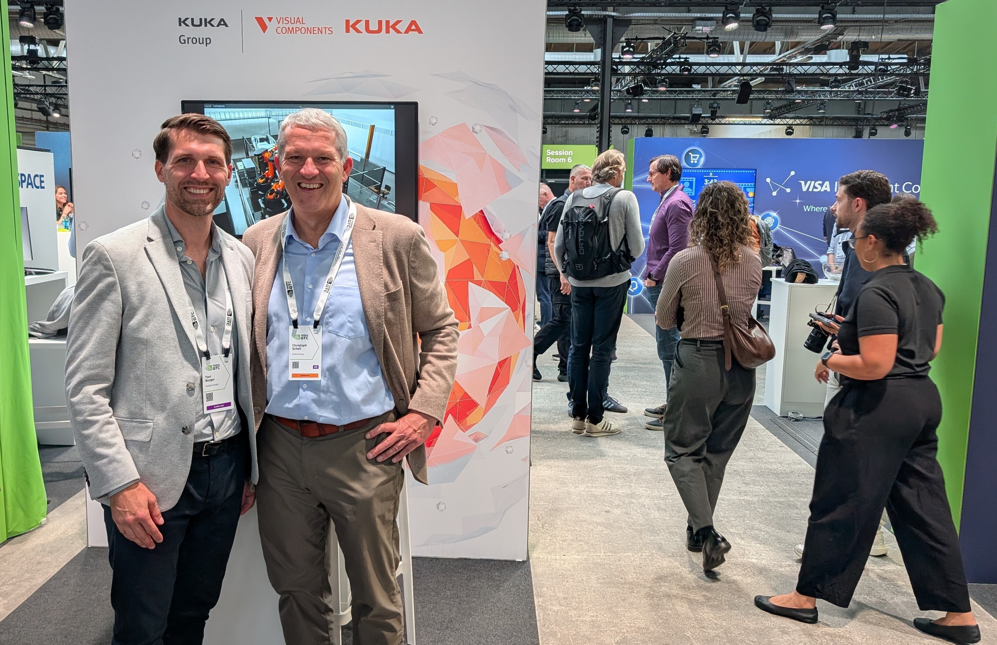 Toni Burger (CEO und CFO von Komsa, links) und Kuka-CEO Christoph Schell auf der NVIDIA GTC Berlin 2026. Foto: Kuka